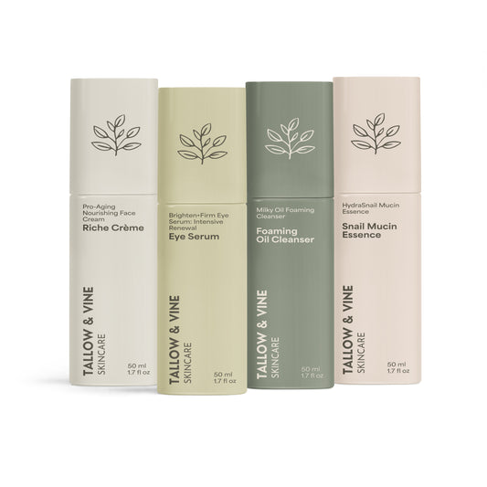 Four Tallow & Vine skincare product boxes on a white background